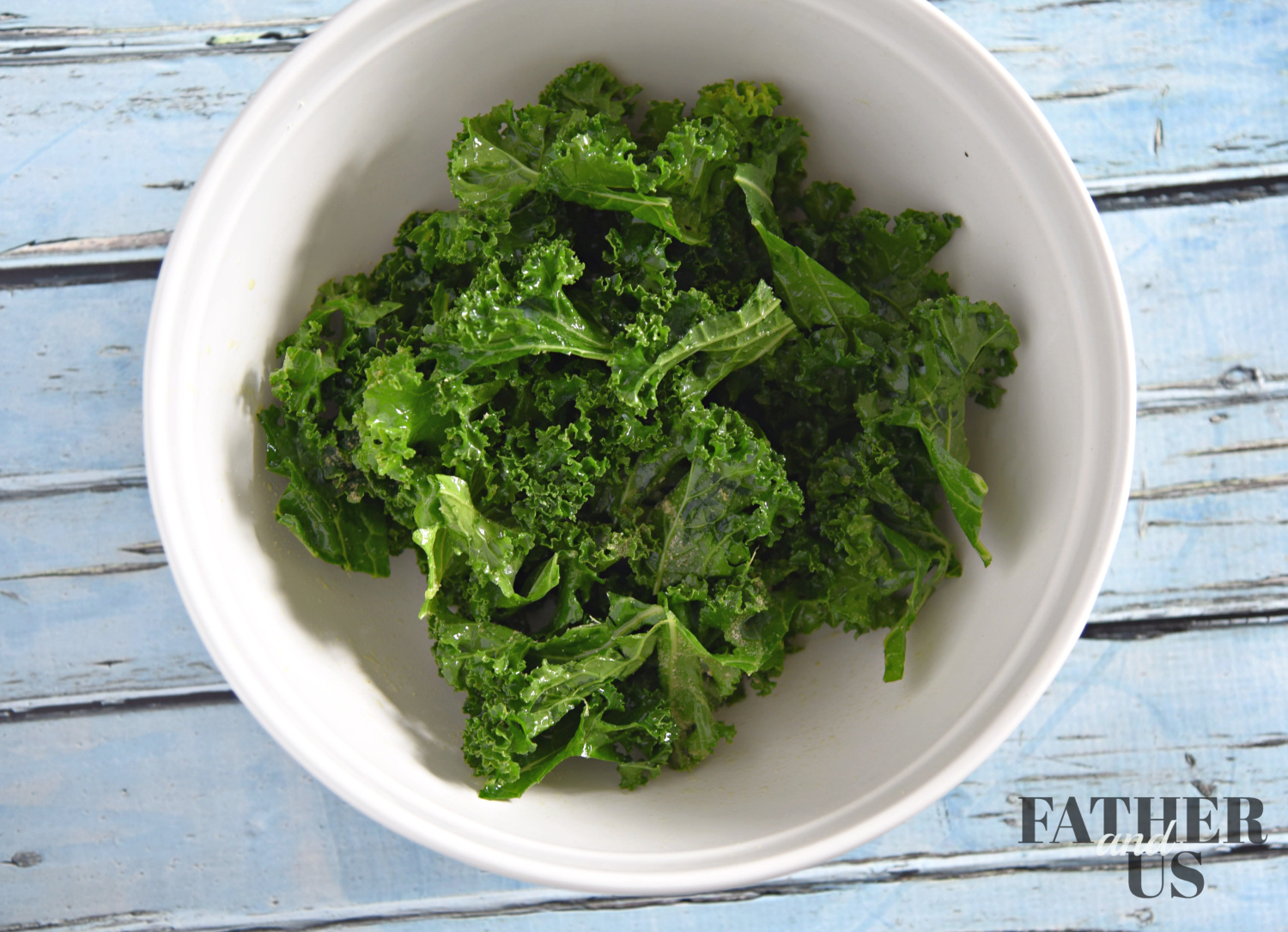 coat your kale air fryer with olive oil, making sure you cover it completely. 
