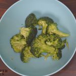 making Air Fryer Broccoli involves mixing the vegetables, oil and seasonings together before cookinig