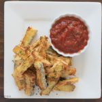 Air Fryer Eggplant Fries served with a side of marinara sauce.