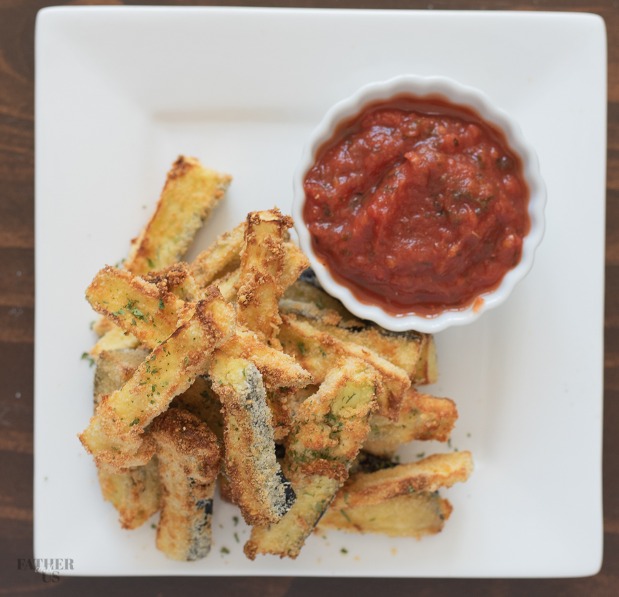 Air Fryer Eggplant Fries served with a side of marinara sauce.